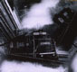 "Train". Silver gelatin print from constructed kaleidoscopic lens.